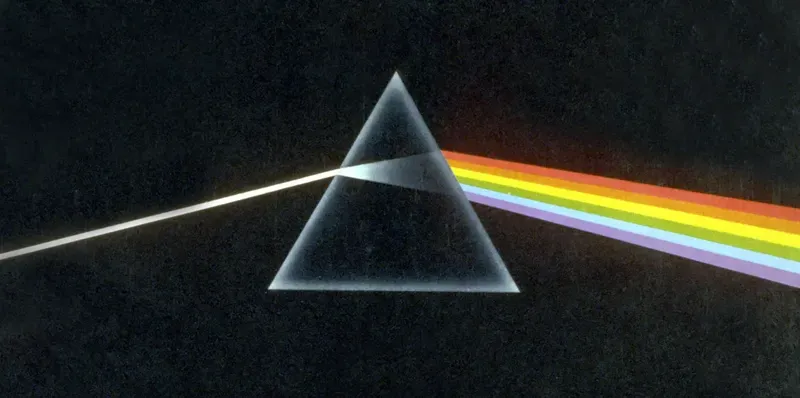 Pink Floyd's Dark Side of the Moon album art: white light entering a prism and splitting into a rainbow
